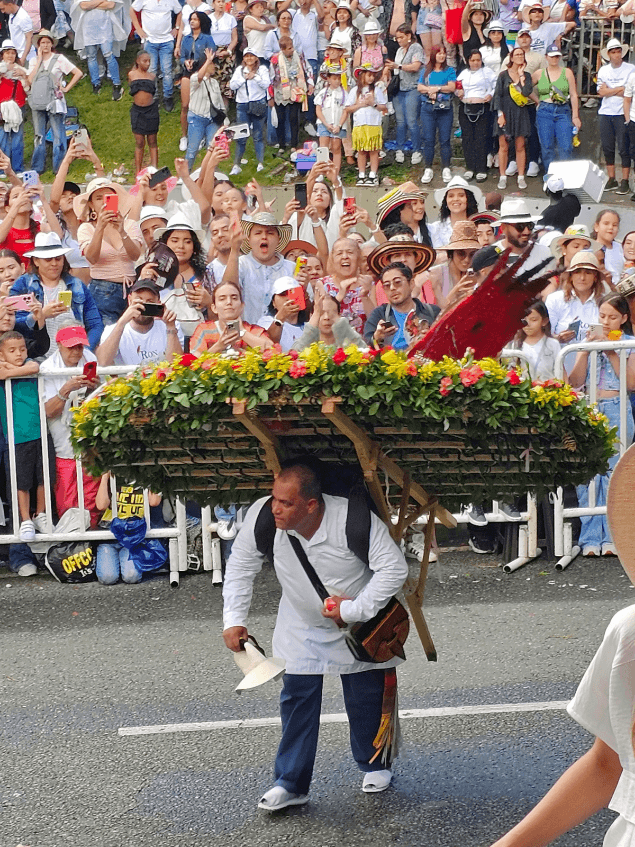 Silleteros parading with flower silletas during the Flower Fair in Medellín