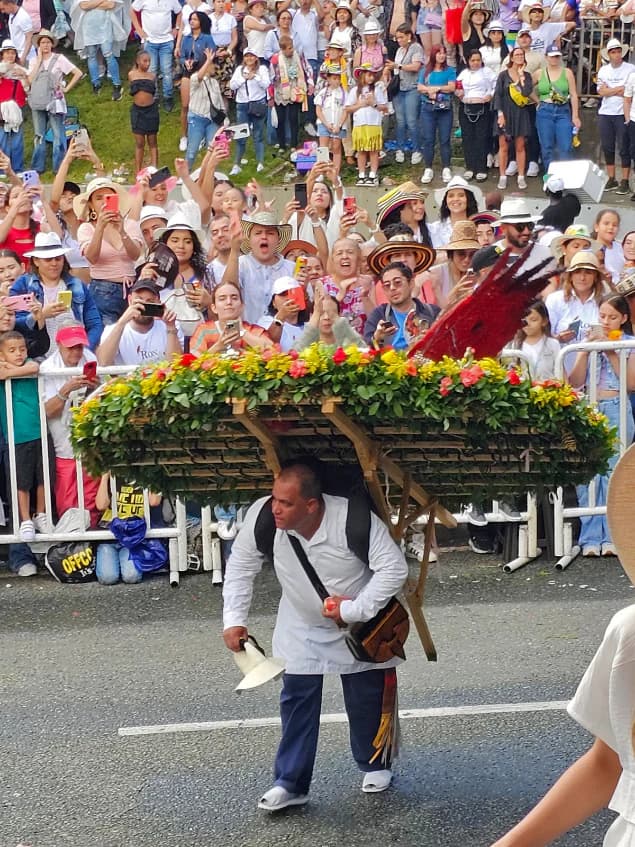 Silleteros parading with flower silletas during the Flower Fair in Medellín