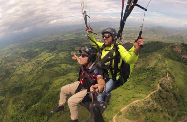 Paragliding over the mountains and coffee farms of Buenavista, Quindío, Colombia